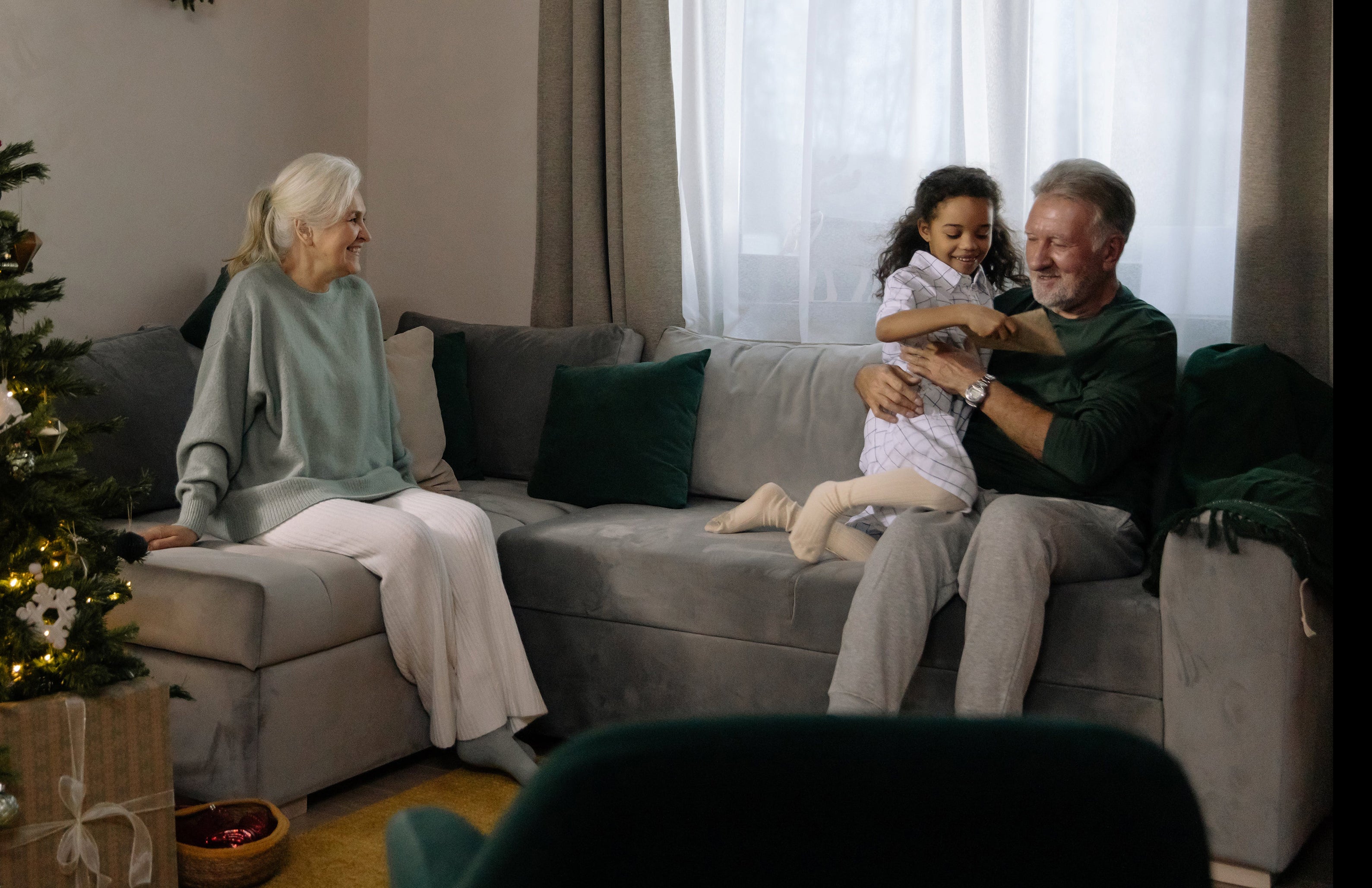 grandparents with granddaughter